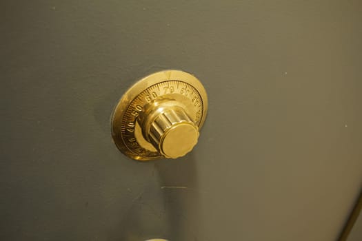Close-up of an old bank safe with combination lock