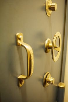 Close-up of an old bank safe with combination lock