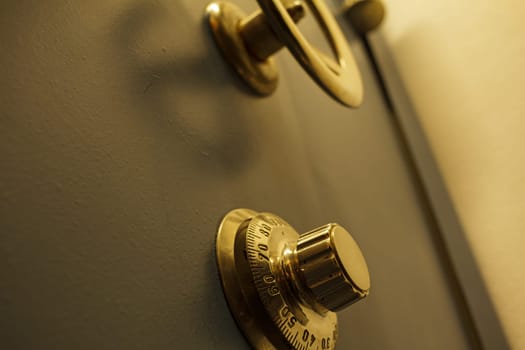 Close-up of an old bank safe with combination lock