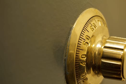 Close-up of an old bank safe with combination lock