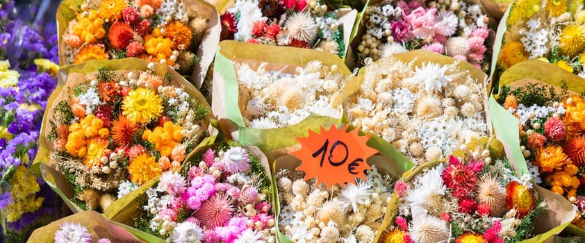 Vintage flowers market on public street - retro cottagecore style