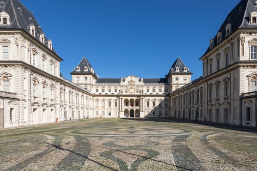 Turin, Italy - February 2023: castle exterior. Historical landmark with blue sky and daylight
