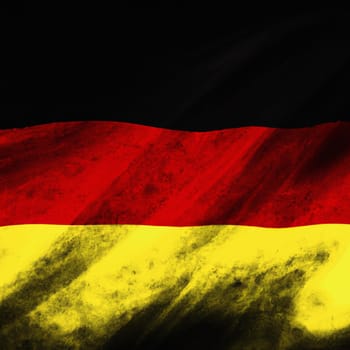Flag of Germany - three equal horizontal stripes of black, red, golden yellow. Illustration or drawing of the German flag waving in the wind, darkened from the sides. Copy space on a black background