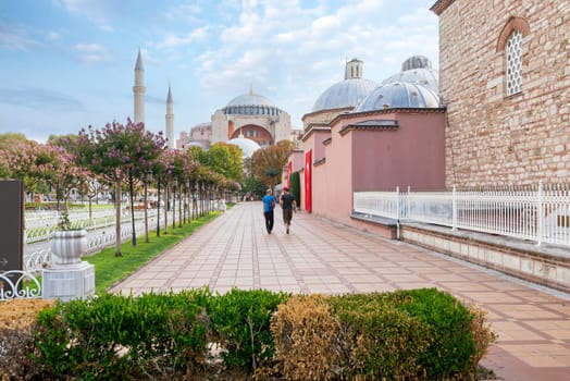 Istanbul, Turkey - August 30 2022: Hagia Sophia, or Ayasofya, formerly a Greek Orthodox church, currently a mosque, and Hagia Sophia Hurrem Sultan Bathhouse, located in Sultanahmet Square