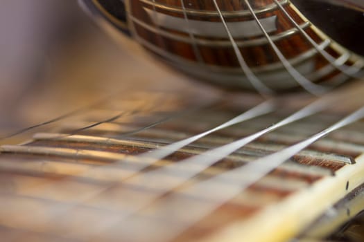 Macro of guitar-strings reflected