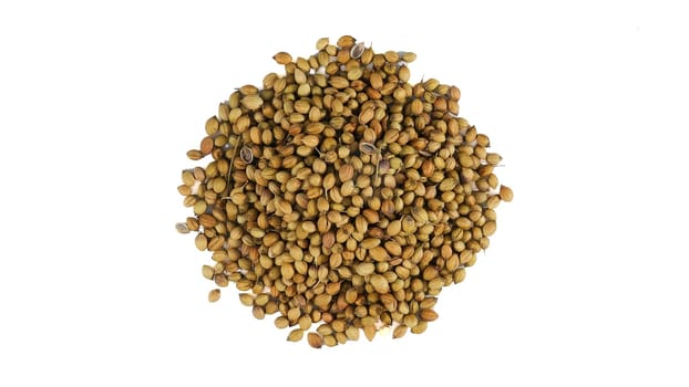 Table top from coriander seeds isolated on white background from above