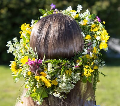 Swedish Midsummer Headgear Traditional on a female head of hair.