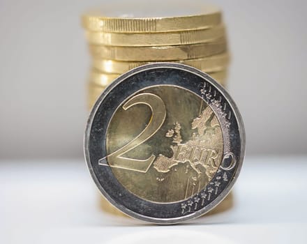 Two euro coins, close-up of a coin with the value of 2 euros.