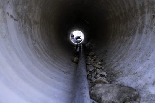 Detail of old sewer pipe, ruin and dirt