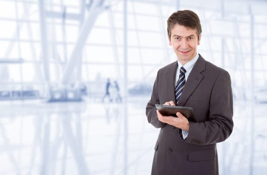 businessman using touch pad of tablet pc, at the office