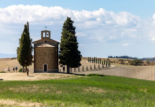 Pienza, Italy - September 12, 2022: Capella Di Vitaleta in countryside between San Quirico and Pienza in Val d Orcia Tuscany. Italy