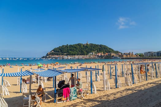 San Sebastian, Basque Country, Spain: August, 20, 2022: Landscape of La Concha beach in the city of San Sebastian, in the Spanish Basque Country