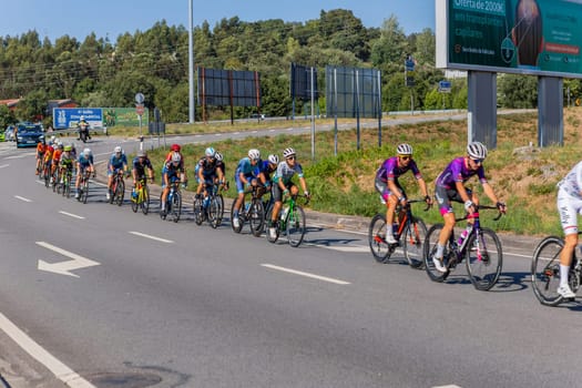Braga, Portugal : 12 August 2022, - Cyclists taking part in stage Santo Tirso - Braga in Volta a Portugal race, Braga, Portugal