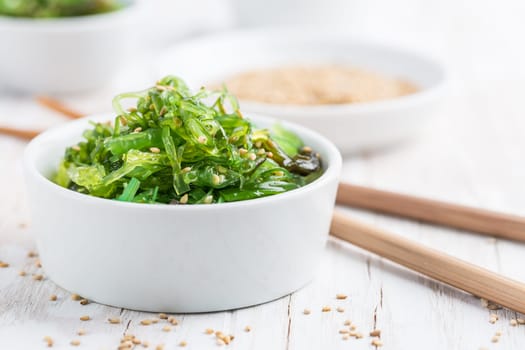 Wakame seaweed salad with sesame seeds. Traditional Japanese food.