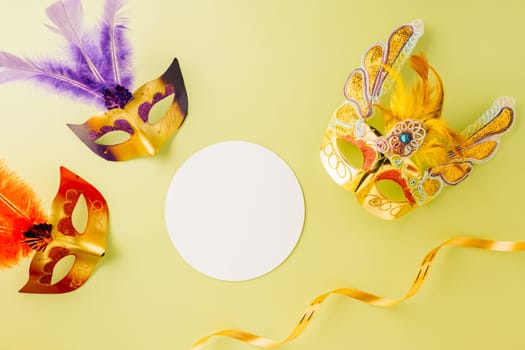 Happy Purim carnival accessories. Carnival mask for Mardi Gras celebration isolated on pastel green background with white paper circle, jewish holiday, Purim in Hebrew holiday carnival ball
