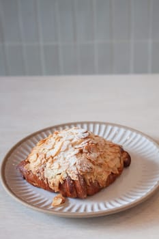 Freshly baked French croissant served in coffee shop, stock photo
