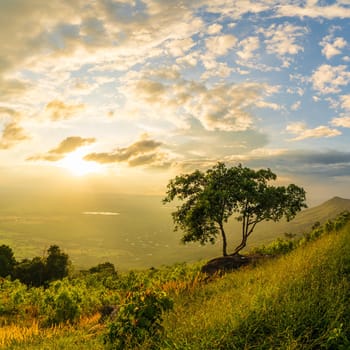 Mountain landscape with colorful vivid sunset on the cloudy sky,Sunset in nature with lighted clouds