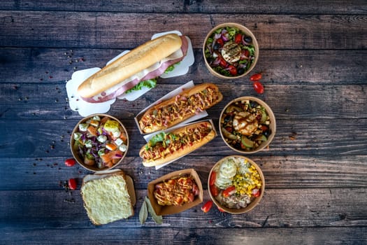 mixed fast food ready to be eat on a wooden table