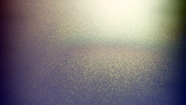 Oblique rays of light on a dark background. Blurred abstract backdrop with light effect and leaks. Side surface illumination. Divergent and asymmetric lines, stripes of light at angle. Yellowish glow.