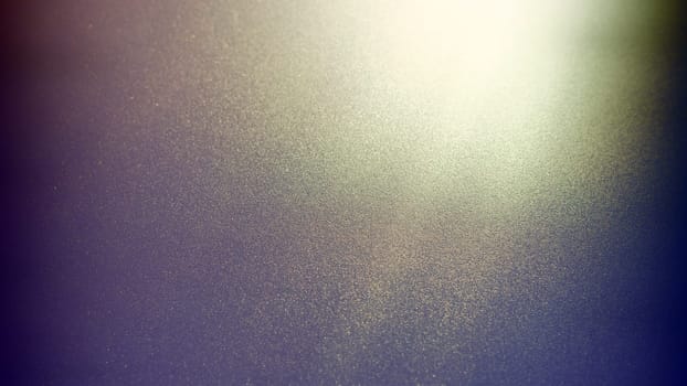 Oblique rays of light on a dark background. Blurred abstract backdrop with light effect and leaks. Side surface illumination. Divergent and asymmetric lines, stripes of light at angle. Yellowish glow.