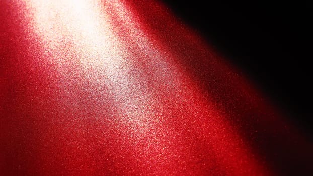 Diagonal rays of light on a red or scarlet background. Blurred abstract background light effect, light leaks. Side surface illumination. Parallel and asymmetric lines or stripes of light at an angle