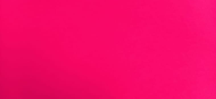 Pink beautiful or fuchsia bright background. Scarlet, purple uneven color. Sheet of colored paper.