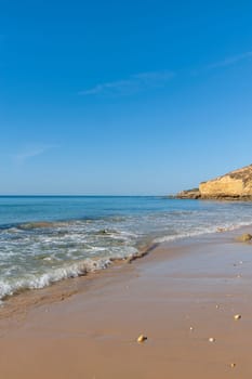 Maria Luisa beach with rock formation in Albufeira, Algarve, Portugal.................