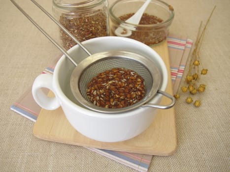 Flaxseed tea, a cup of tea from brown flax seeds
