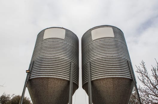 Animal feed silos. Zinc-coated storage for animal husbandry
