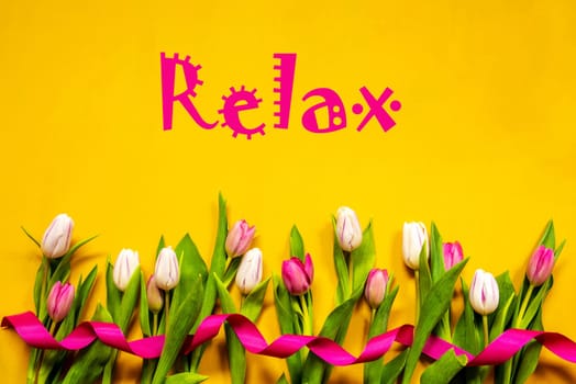 English Text Relax. White And Pink Tulip Spring Flowers With Ribbon. Yellow Wooden Background