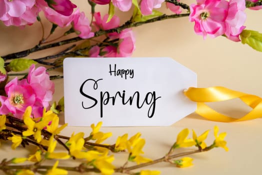 Spring Flower Arrangement With White Label With English Text Happy Spring. Colorful Flower Branch Decoration With Yellow And Purple Blossoms.