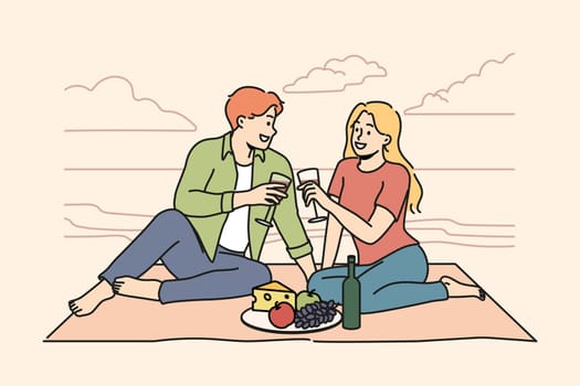 Happy couple sitting on blanket on seashore enjoying romantic date together. Smiling man and woman relax having romance on beach. Love and relationships. Vector illustration.