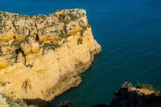 Ponta da Piedade cliffs near Lagos, Portugal. Beautiful seascape with natural rock formations in the Algarve, Portugal