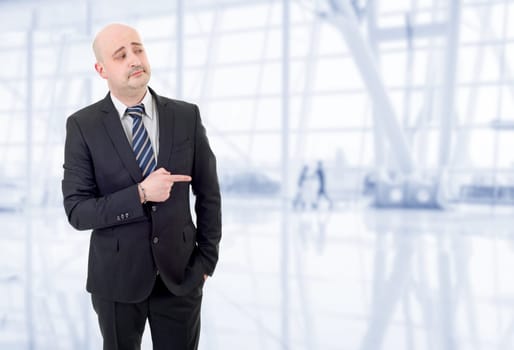 young business man pointing, at the office