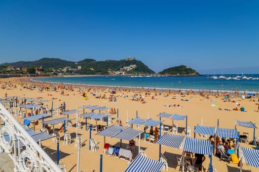 San Sebastian, Basque Country, Spain: August, 20, 2022: Landscape of La Concha beach in the city of San Sebastian, in the Spanish Basque Country