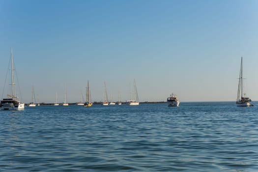 Ferragudo, Portugal - 25 August 2025: Port at the beach, Praia Grande beach. Ferragudo, Lagoa, Algarve, Portugal