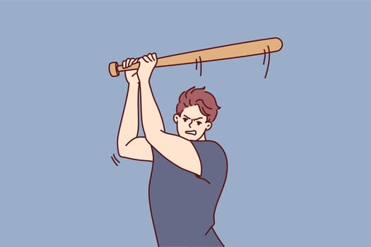 Aggressive man swings wooden bat to hit ball or fend off attacking criminals. Aggressive guy attacks people using baseball bat as weapon, wanting to beat and injure opponent after argument
