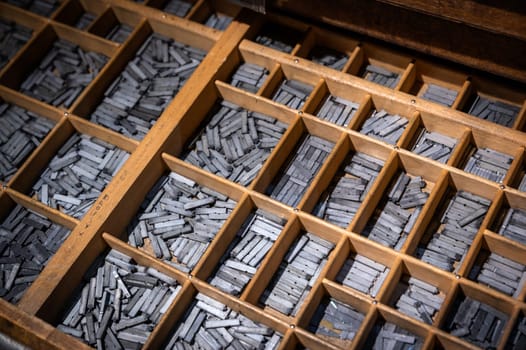 Old printing company with old metal letters in a drawer