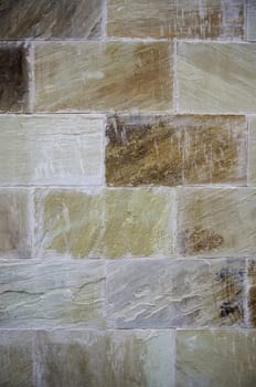 Detail of wall covered and decorated with natural stone, architecture