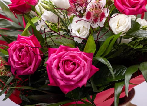 beautiful florist bouquet of roses and freesias