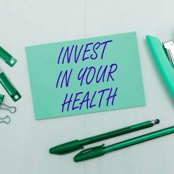 Hand writing sign Invest In Your Health, Internet Concept Live a Healthy Lifestyle Quality Food for Wellness