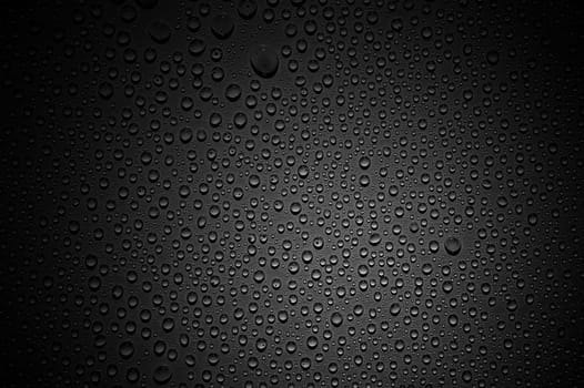 Dark background texture with water drops