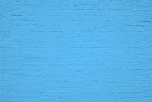 Old weathered brick wall background texture with blue color