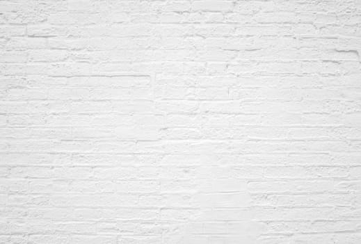 Old weathered brick wall background texture with white color