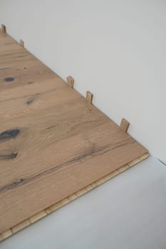 parquet floor laying in a new room, loft, new house