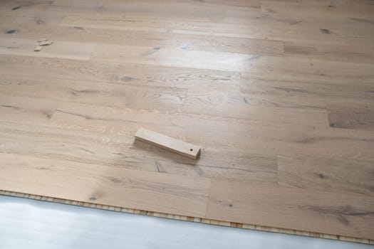 parquet floor laying in a new room, loft, new house