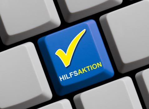 Charity in german language - Blue computer Keyboard with yellow tick