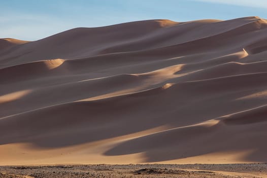 The orange dunes of the libyan Sahara desert..........