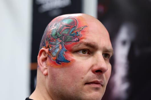 Krakow, Poland -  June 12, 2022: Unidentified  participant at 15th Tattoofest Convention in Cracow. One of the most prestigious tattoo festivals.