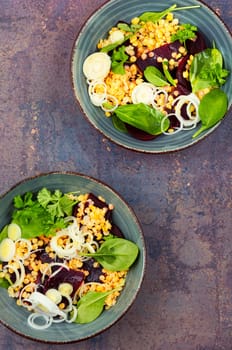 Salad with beetroot, lentils, onions and herbs in bowl. Traditional Indian cuisine.
